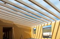 Gebäudeaufstockung in Holzrahmenbauweise und Holzmassivbau Okaty Hachenberger